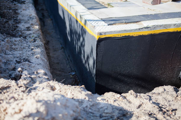 Professional Emergency Waterproofing technician working in Getzville, NY